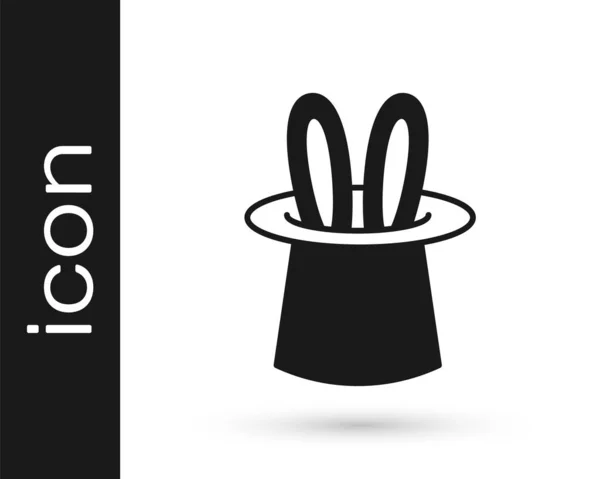 Black Magician hat and rabbit ears icon isolated on white background. Magic trick. Mystery entertainment concept. Vector — Stock Vector