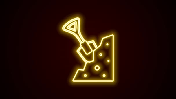 Glowing neon line Shovel and stone icon isolated on black background. Gardening tool. Tool for horticulture, agriculture, farming. 4K Video motion graphic animation — Stock Video