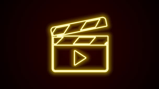 Светящийся неоновая линия Кино хлопок значок изолирован на черном фоне. Доска для аплодисментов. Вывеска на доске. Кинопроизводство или медиаиндустрия. Видеографическая анимация 4K — стоковое видео