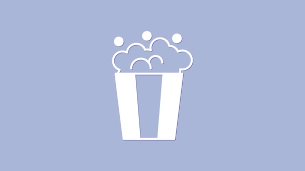 Белый попкорн в картонной коробке значок изолирован на фиолетовом фоне. Коробка с попкорном. Видеографическая анимация 4K — стоковое видео