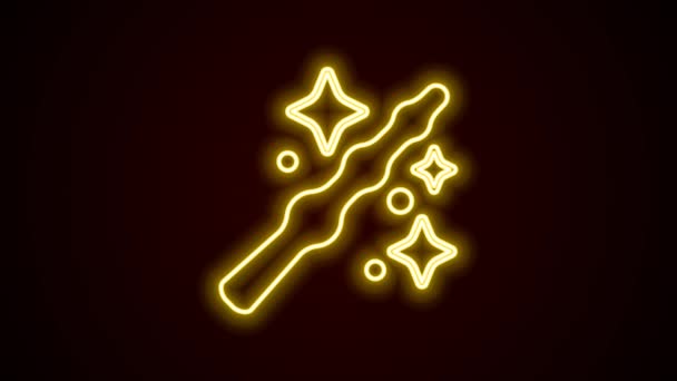 Glowing neon line Magic wand icon isolated on black background. Star shape magic accessory. Magical power. Happy Halloween party. 4K Video motion graphic animation — Stock Video