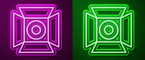 Gloeiende neon lijn Film spotlight pictogram geïsoleerd op paarse en groene achtergrond. Licht effect. Scene, Studio, Show. Vector — Stockvector