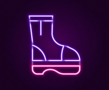 Parlayan neon çizme çizmesi simgesi siyah arkaplanda izole edildi. Renkli taslak konsepti. Vektör