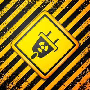 Sarı arka planda siyah radyasyon elektrik prizi ikonu izole edildi. Nükleer enerji. Uyarı işareti. Vektör