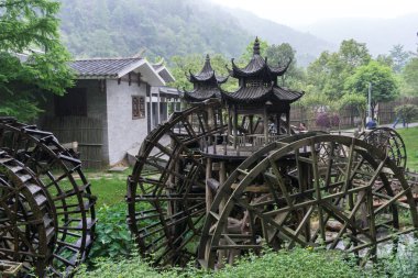 huanglong dong entrance water mills clipart
