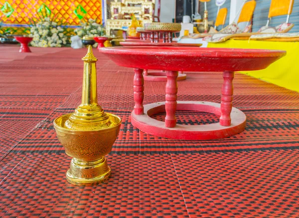 Golden pour water containers for Buddhist ceremony. — Stock Photo, Image