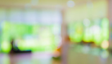 Arkaplan kullanımı için Bokeh kullanan modern bir iş merkezinin lobisinin soyut bulanık görüntüsü .