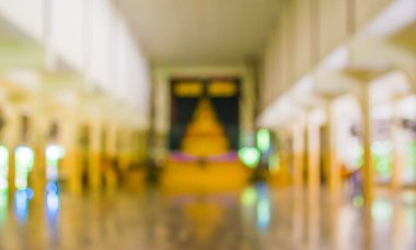 Bokeh 'in arka plan kullanımı için kullandığı Budist tapınağının soyut bulanık görüntüsü .