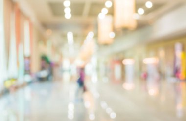 Alışveriş merkezinin bulanık görüntüsü ve arka plan kullanımı için insanlar