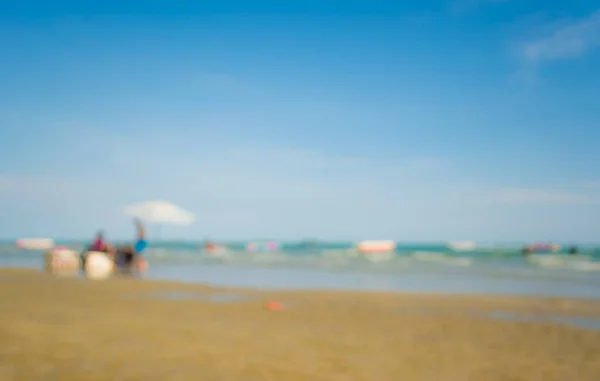 Abstrakcyjny Obraz Rozmytych Osób Spacerujących Plaży Tle — Zdjęcie stockowe