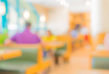 Arka plan kullanımı için Bokeh ile restoranın bulanık görüntüsü. (sıcak ton))