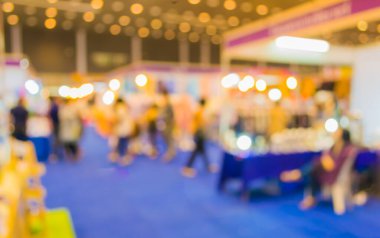 Ticaret fuarının bulanık görüntüsü ve arka plan kullanımı için insanlar. (Klasik ton))