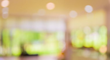 Arkaplan kullanımı için Bokeh kullanan modern bir iş merkezinin lobisinin soyut bulanık görüntüsü .