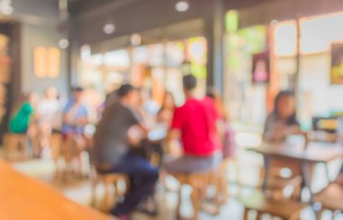 Arka plan kullanımı için Bokeh imajı olan restoran ya da kahve dükkanı bulanıklığı  .