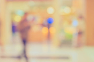 Alışveriş merkezinin bulanık görüntüsü ve arka plan kullanımı için insanlar. (Klasik ton))