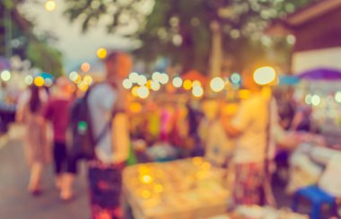 Arka plan kullanımı için Bokeh ile gece pazarının klasik ton bulanık görüntüsü .