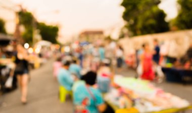 Arka plan kullanımı için günlük piyasanın soyut bulanık görüntüsü. (Klasik ton))