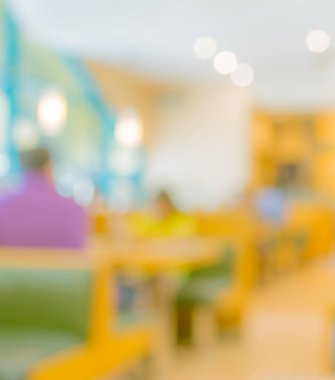 Arka plan kullanımı için Bokeh ile restoranın bulanık görüntüsü. (sıcak ton))