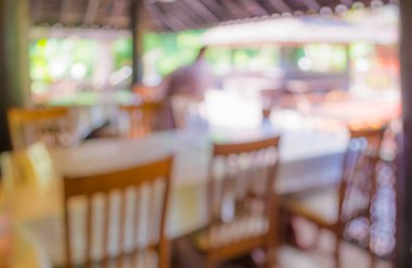 Arka plan kullanımı için Bokeh 'le gündüz vakti restoranın bulanık görüntüsü. (Klasik ton))