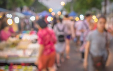 Sokakta gece pazarının Bokeh ile bulanık arkaplanının klasik ton bulanık görüntüsü .
