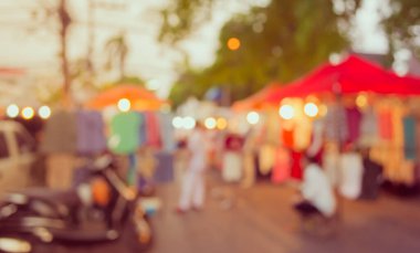 Arka plan kullanımı için Bokeh ile gece pazarının klasik ton bulanık görüntüsü .