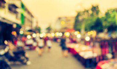 Arka plan kullanımı için Bokeh ile gece pazarının klasik ton bulanık görüntüsü .
