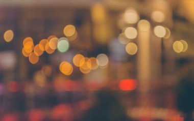 Sıcak renkli ışıklarla bulanık bokeh arkaplan görüntüsü. (Klasik ton))