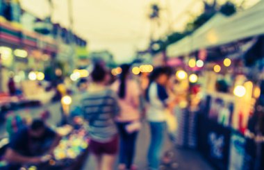 Arka plan kullanımı için Bokeh ile gece pazarının klasik ton bulanık görüntüsü .