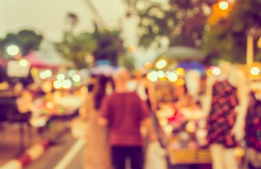 Arka plan kullanımı için Bokeh ile gece pazarının klasik ton bulanık görüntüsü .