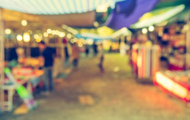 Arka plan kullanımı için Bokeh ile Street Day Market 'in soyut bulanık görüntüsü. (Klasik ton))