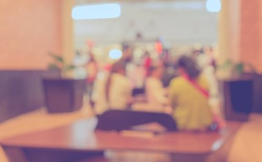 Kafenin arka planında Bokeh imajı var. (Klasik ton))