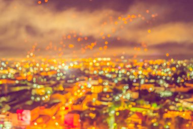 Arka plan kullanımı için Chiang Mai, Tayland 'dan Bokeh ile klasik ton bulanık ışıklar .