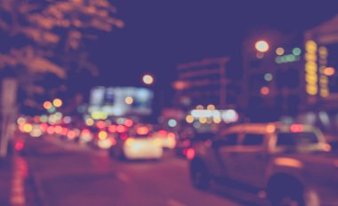 Gece vakti arkaplan kullanımı için Bokeh ile Yol 'un soyut bulanık görüntüsü .