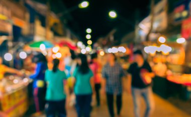 Arka plan kullanımı için Bokeh ile gece pazarının klasik ton bulanık görüntüsü.