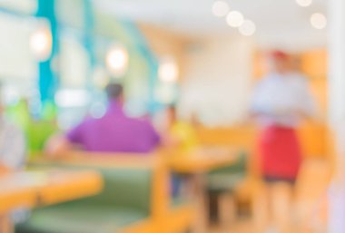 Arka plan kullanımı için Bokeh ile restoranın bulanık görüntüsü. (sıcak ton))