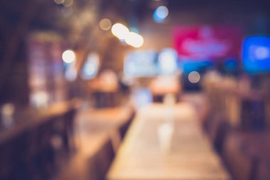 Arka plan kullanımı için Bokeh ile boş kahve dükkanının klasik ton bulanık görüntüsü .