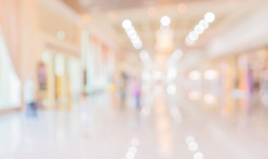 Alışveriş merkezinin bulanık görüntüsü ve arka plan kullanımı için insanlar