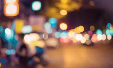 Arka plan kullanımı için sokak gecesi Bokeh 'inin klasik ton soyut bulanık görüntüsü .