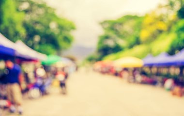 Arka plan kullanımı için günlük piyasanın soyut bulanık görüntüsü. (Klasik ton))