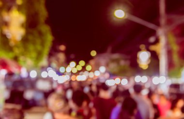 Arka plan kullanımı için Bokeh ile gece pazarının klasik ton bulanık görüntüsü.