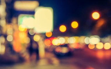 Arka plan kullanımı için Bokeh ile Gece Pazarı 'nın soyut bulanık görüntüsü. (Klasik ton))