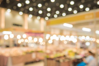 Geniş ve modern salondaki panayırda arka plan için bulanık bir kabin..