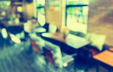 Kafenin arka planında Bokeh imajı var. (Klasik ton))