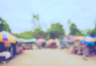 Arka plan kullanımı için günlük piyasanın soyut bulanık görüntüsü. (Klasik ton))