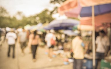 Arka plan kullanımı için günlük piyasanın soyut bulanık görüntüsü. (Klasik ton))