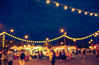 Arka plan kullanımı için Bokeh ile sokak festivali yiyecek kamyonunun klasik ton bulanık görüntüsü .