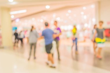 Alışveriş merkezinin bulanık görüntüsü ve arka plan kullanımı için insanlar .