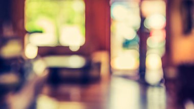 Gündüz vakti Bokeh 'in arka plan kullanımı için kullandığı kafenin ya da restoranın soyut bulanık görüntüsü. (Klasik ton))