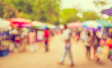 Arka plan kullanımı için günlük piyasanın soyut bulanık görüntüsü. (Klasik ton))