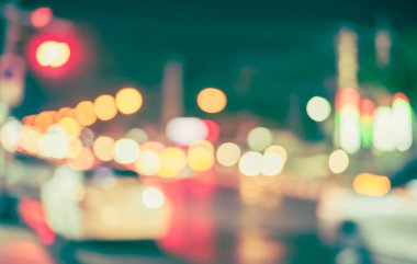Arka plan kullanımı için sokak gecesi Bokeh 'inin klasik ton soyut bulanık görüntüsü .